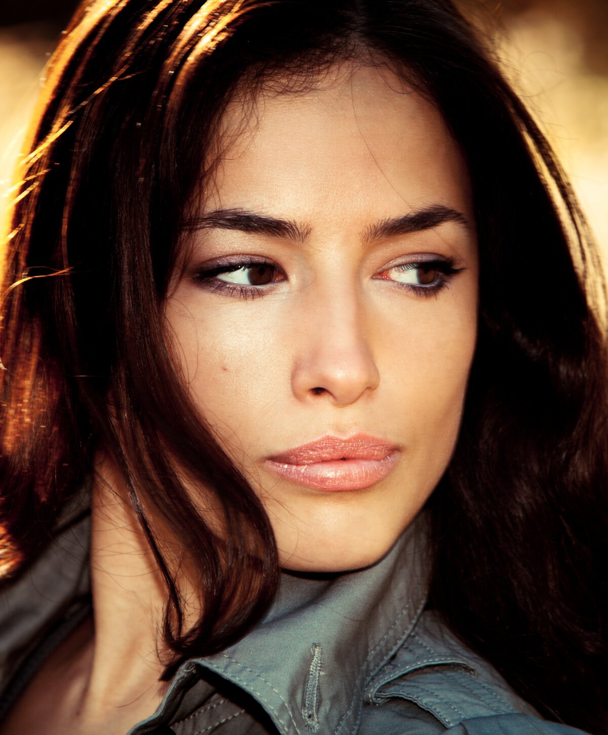 New Orleans Liquid Rhinoplasty model looking over her shoulder